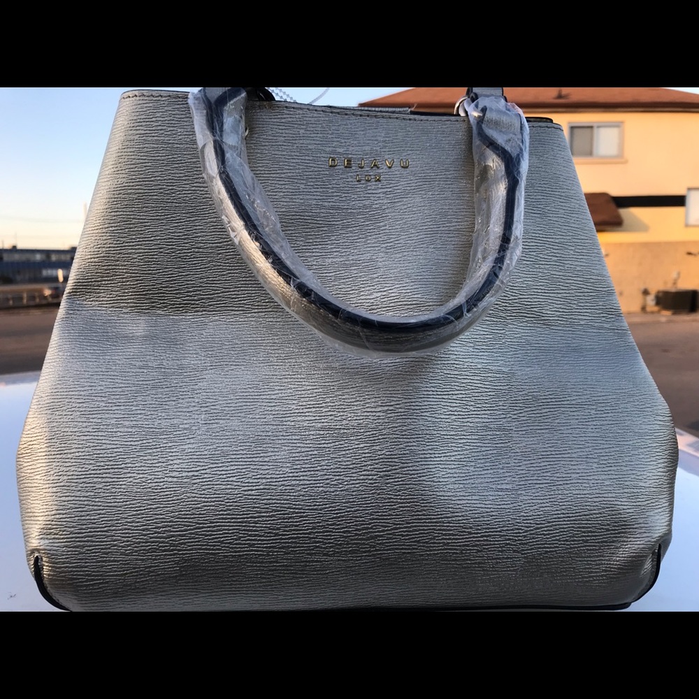 New DejaVu Bag Gold never used